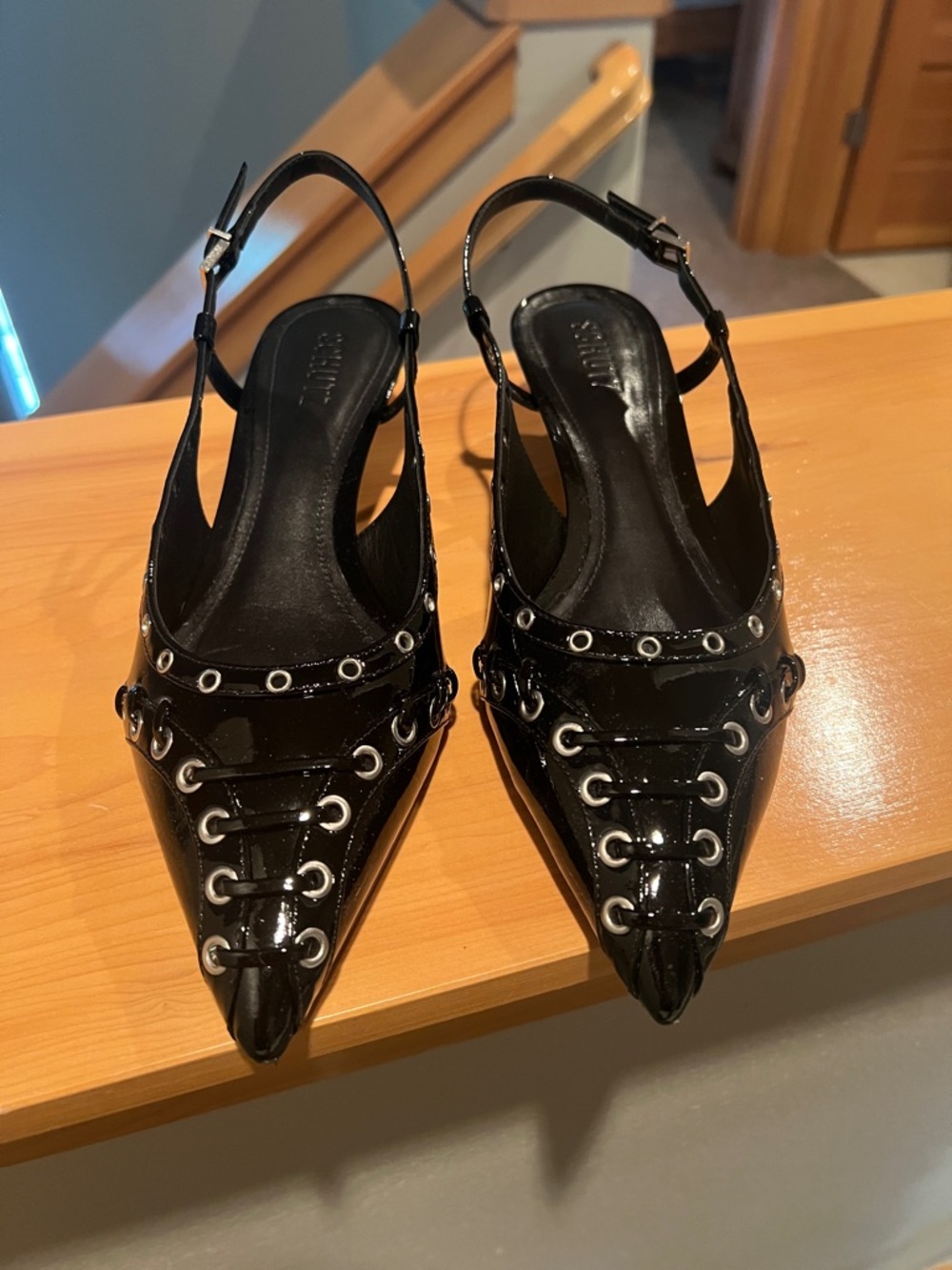 Schutz Slingback Pointed Toe Patent Leather kitten hewith Grommet Detail - Black